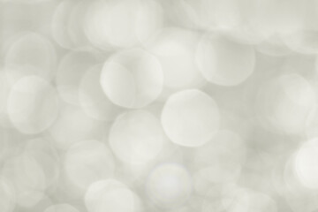 Abstract background grey bokeh lights.