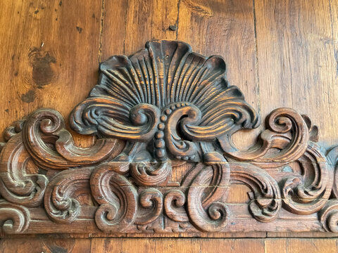 Fragment of wood carving on the door. 