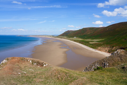 On the cliff tops above Rhossili beach at low tide.
