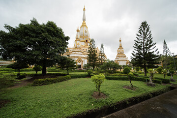 Fototapeta premium Phra Maha Chedi Chai Mongkol, one of the largest chedis (pagoda) in Thailand, in Amphoe Nong Phok, Roi Et Province in northeast Thailand.