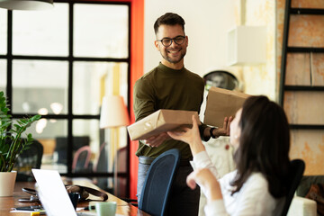 Colleagues in office. Businesswoman and businessman working together.