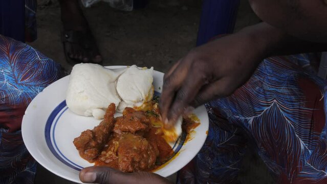 Africa Nigeria local popular dishes known as ewedu and eba .