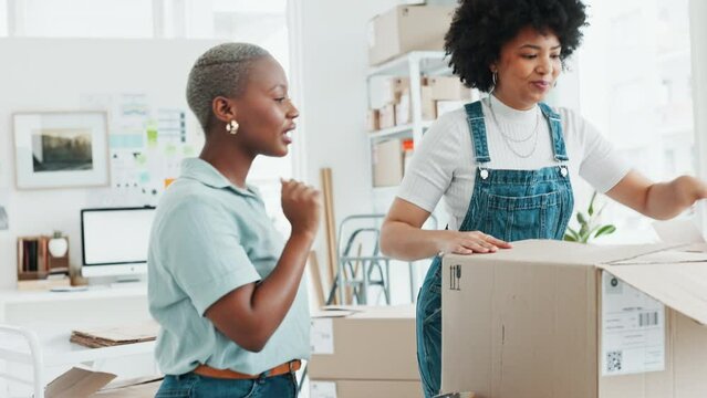 Team of business women with delivery, packing and shipping products. Black women in the office for startup, ecommerce and online shopping company putting package or stock in a box for customers