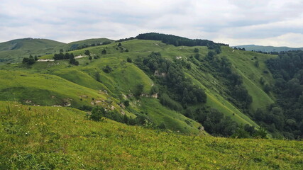 Fototapeta na wymiar Panoramic views from Bolshoye Sedlo mountain to the Kislovodsk National Park and the city of Kislovodsk, North Caucasus, Russia.