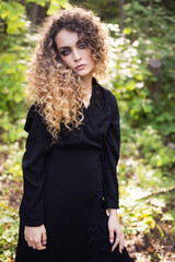 Portrait of young beautiful woman. Natural light. Shallow depth of field.