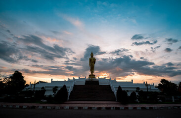 Silhouette of Buddha with sunset light