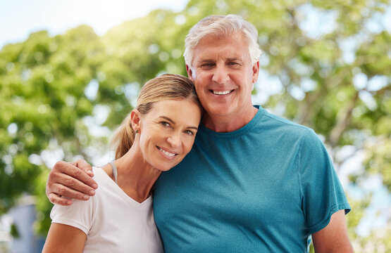 Wellness, health and elderly couple bonding on outdoor morning walk in nature, happy and relax. Love, exercise and cardio with man and woman portrait hug and enjoy retirement, being active together