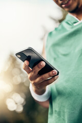 Sports, exercise and hand of man with phone to check steps, health and fitness tracker or workout support app. Tech, cardio and black runner review his marathon training progress on mobile smartphone