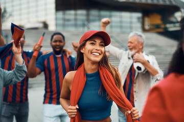 Happy female soccer fan has fun during world cup.
