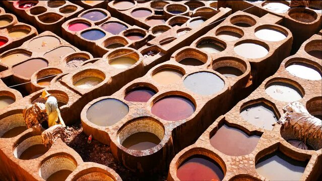 Timelapse of Warking people moving on Leather Tanneries. Fez, Morocco.