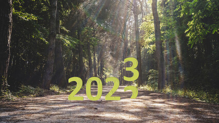 Happy New Year 2023 anniversary is coming. Transition from 2022 to new year concept with 2023 text...