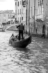 Fototapeta na wymiar Gondolas on the ancient canals of Venice, Italy