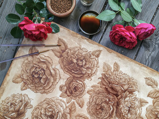 Picture of a vintage rose painted with coffee.