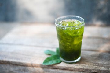 Green Tiliacora Juice in glass. - obrazy, fototapety, plakaty