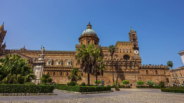 Monreale Cathedral in Palermo, Sicily, Italy. Tour groups pose for photos. 