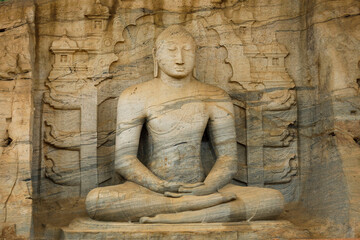Fototapeta na wymiar buddha statue at temple carved in stone