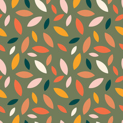Autumn leaf fall on a green background. Seamless cute pattern with leaves or grains in different colors. 