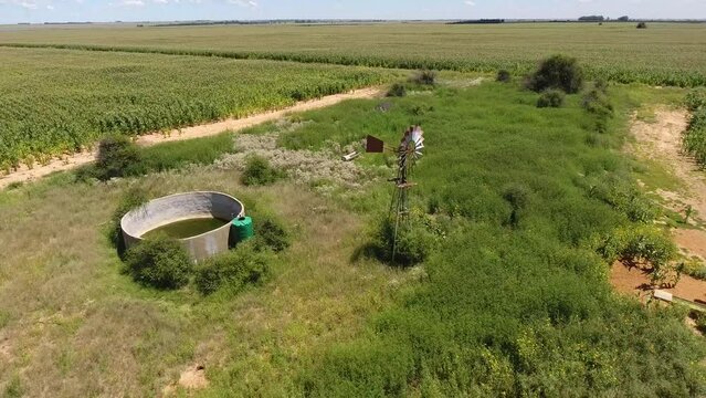 Farm dam surrounded by fields