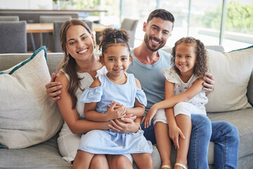 Father, mother and children smile, love and relax on the sofa together in the house living room. Portrait of happy family bonding in a lounge with happiness, care and trust in a healthy relationship - Powered by Adobe