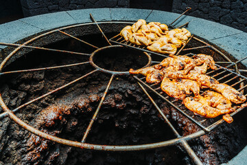 Chicken barbecued on volcanic heat, Timanfaya National Park, Canary Islands, Spain