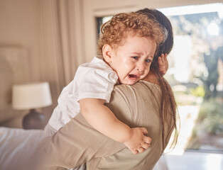 Crying, sad and tears of baby with mom for comfort, safety and attention while hungry, upset or...