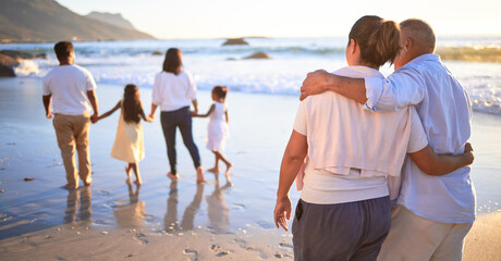 Relax, travel and happy with big family at the beach walking on Bali vacation together for summer,...