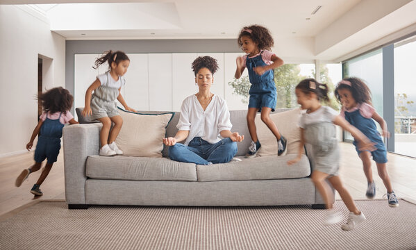 Meditation, yoga mom and children running, energy and hyperactive with adhd with mother doing stress free exercise on sofa in brazil home. Playing, distracted and energetic kids with zen woman