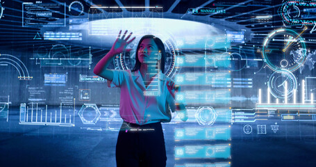 Female Scientist Exploring and Analyzing a Digital Data, Touching an Invisible Holographic Screen....