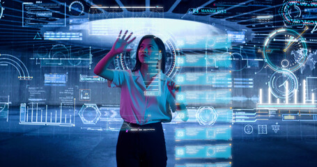 Female Scientist Exploring and Analyzing a Digital Data, Touching an Invisible Holographic Screen. Asian Woman, Business Reviews the Statistics and Moving Animated Virtual Graphs and Table Data
