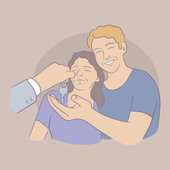 Grey suit hand holding a key and lends it to happy married couple. Newlyweds hugging and getting key from your own home. Buying house concept