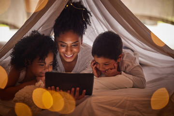 Family, tablet and online streaming with kids for a bedtime story, movie or cartoon for educational...