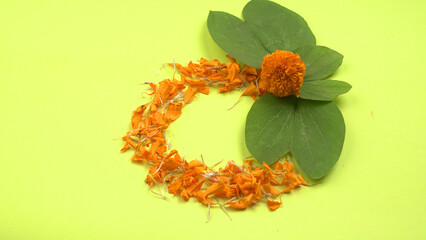Indian Festival Dussehra, showing golden leaf and flowers on moody background. Greeting card.
