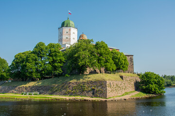 Fototapeta na wymiar Vyborg Castle, a Swedish-built medieval fortress and the Tower of Saint Olav built in 1200's by orders of Torkel Knutsson, Lord High Constable of Sweden in Vyborg in Leningrad Oblast, Russia