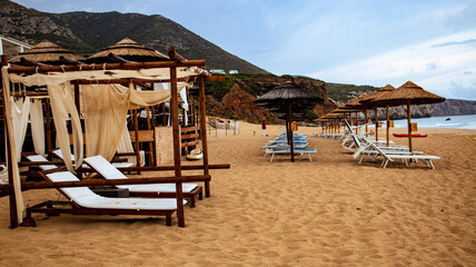 beach chairs and umbrellas on the beach