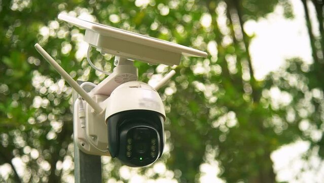 Solar cells panel used energy with motion speed Wi-Fi dome IP CCTV 4G solar camera with sim card system technology signal for looked around security area for safety concept.