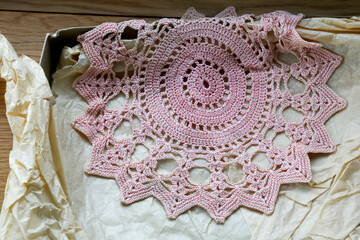 Old fashioned style doily crocheted table decor in pink set in a box with faded tissue paper - 1950