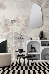 Modern composition of living room interior with white commode, stylish mirror, black&white carpet,...