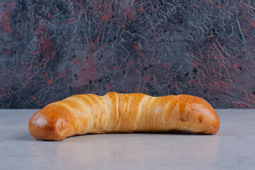 Delicious sweet pastry on stone surface