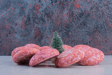 Bunch of pink cookies on festive background