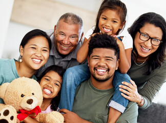 Family house, happy portrait and grandparents in the living room with children, smile during home visit and care on sofa in lounge together. African girl siblings, parents and elderly people on couch