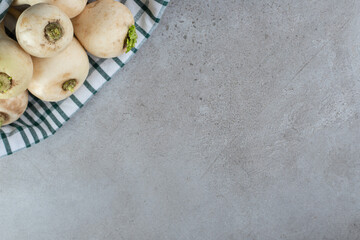 Harvesting fresh white turnips vegetable
