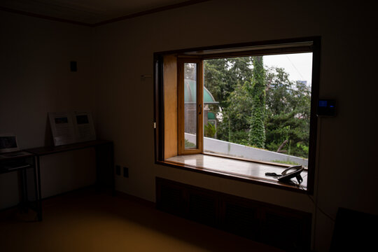 light from a window in a dark room