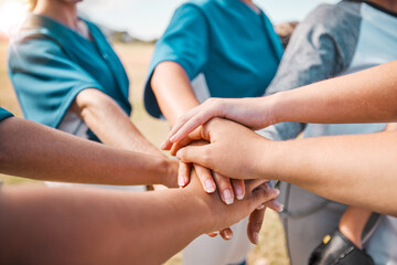 Baseball player women hands for teamwork, motivation and mission on sports field. Group of people, community or athlete girl hand pile for game or competition with outdoor sunshine lens flare