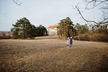 Mother with doughter at Valtice park, Czech Republic.