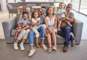 Big family, portrait and happy smile relax on sofa enjoying bonding time together in the living room at home. Mother, father and children with their grandparents relaxing on couch in happiness