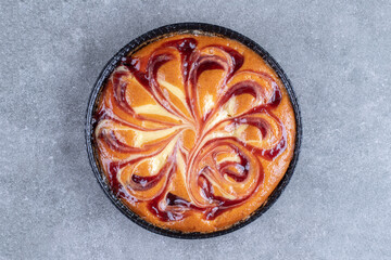 Delicious pie with berry on marble background