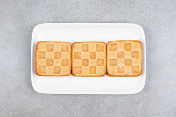 Delicious fresh cookies on a white plate