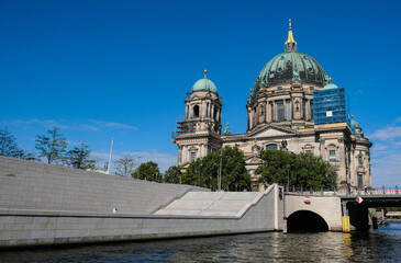Fototapeta na wymiar Berlin Dome on a summer day. Taken from the River Spree with blue sky