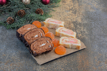 Sweet marmalades in dark plates on a sackcloth