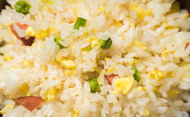 Yangzhou fried rice on wooden background